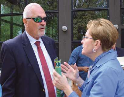 Congresswoman Marcy Kaptur discusses with Rex Huffman, Wood County Port Authority, funding for a proposed pedestrian/bike path bridge spanning the Maumee River and connecting Lucas and Wood counties’ trail systems.