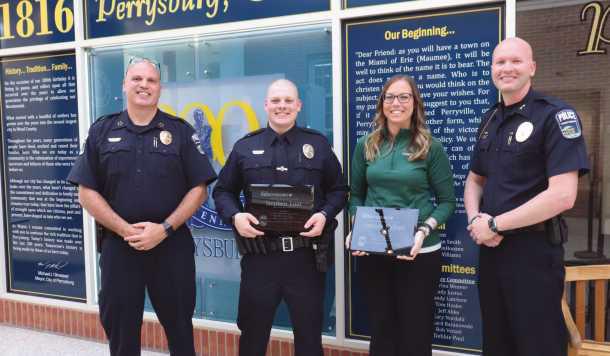 From left, Chief Patrick Jones, Officer of the Year Stephen Loar, Civilian Employee of the Year Amanda Stidham and Deputy Police Chief Chris Sargent.